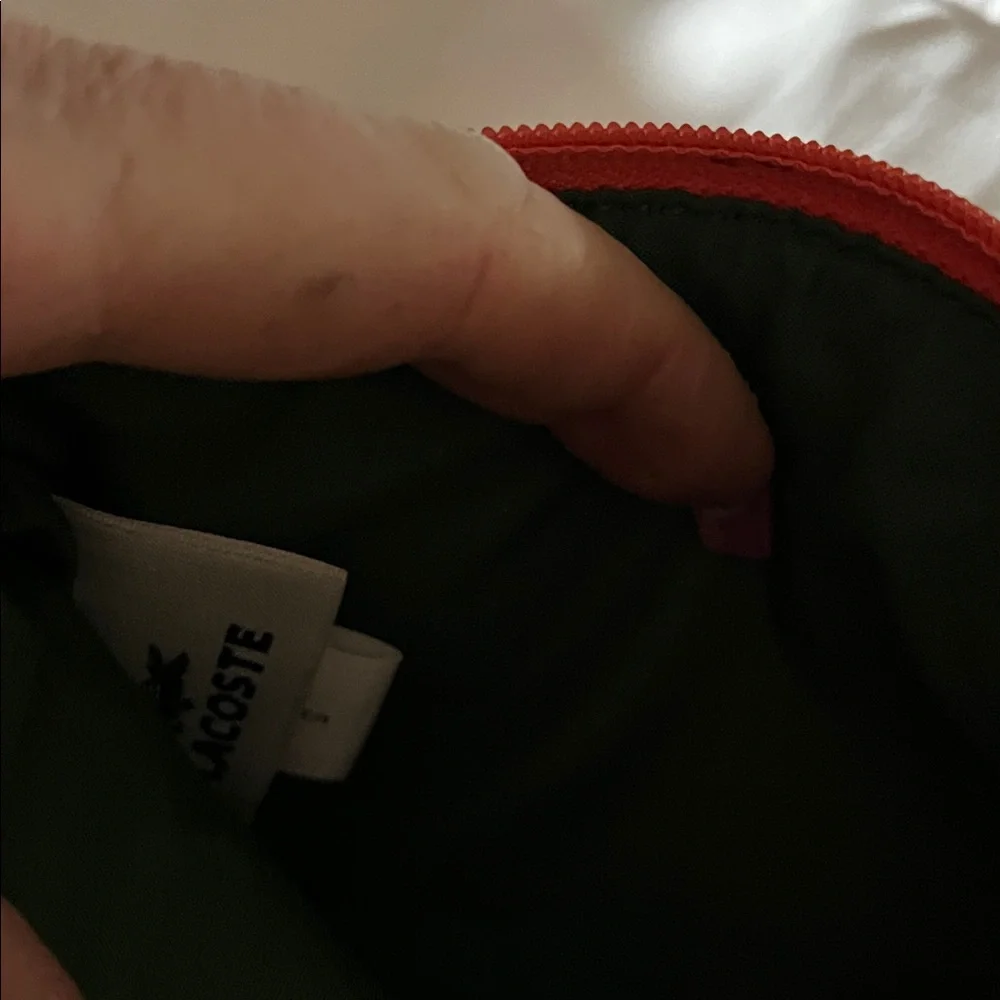 Coral color Lacoste Women's Vibrant Coral Wristlet - Picture 3 of 5